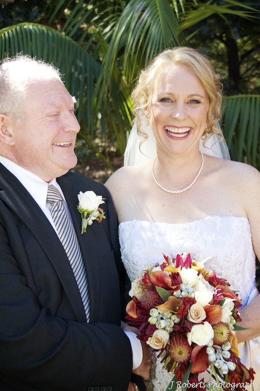 Bride and father laughing - wedding photography sydney